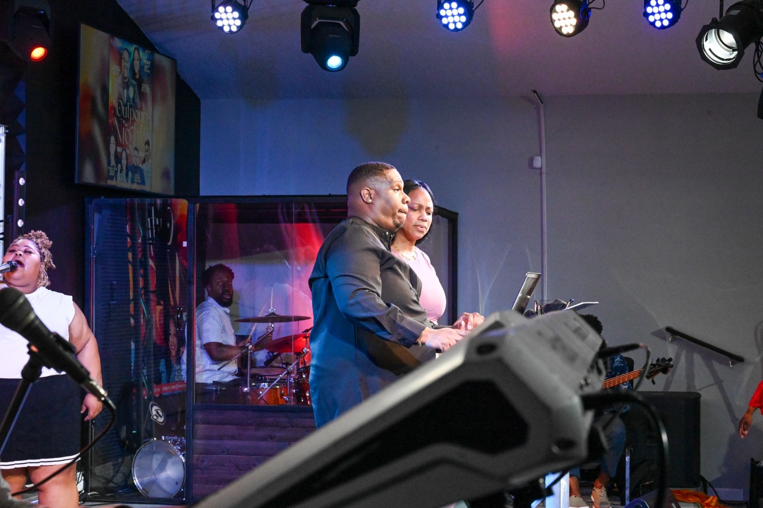 Alyssa ministering at an Outpour gathering
